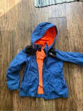 The North Face Kids Blue Raincoat with Orange Lining